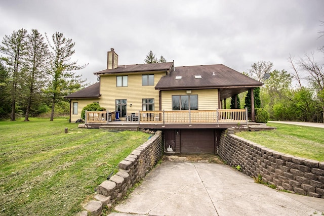 N124W13900 Lovers Ln, Germantown, WI 53022 - back of property featuring a garage, driveway, a deck, a chimney, and a yard