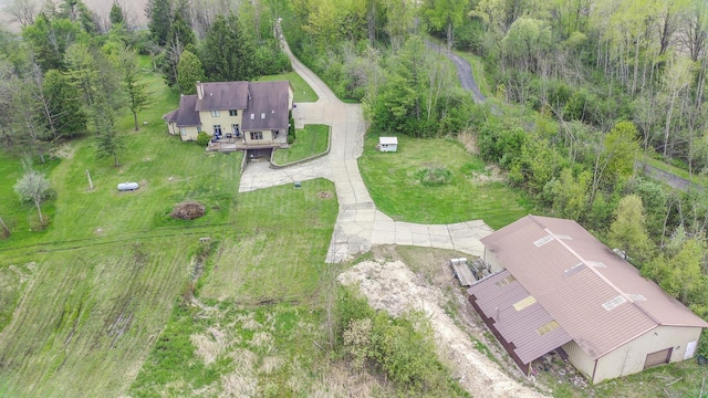 N124W13900 Lovers Ln, Germantown, WI 53022 - aerial view of property and surrounding area featuring a heavily wooded area