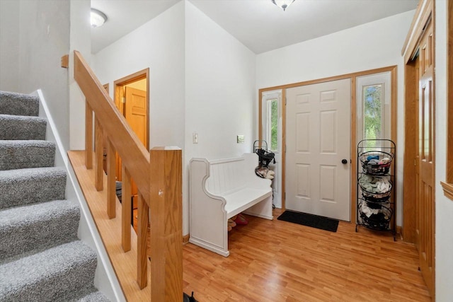 N124W13900 Lovers Ln, Germantown, WI 53022 - foyer entrance featuring light wood-style floors, healthy amount of natural light, and stairway