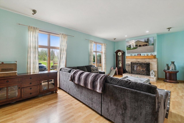 N124W13900 Lovers Ln, Germantown, WI 53022 - living area with a fireplace, wood finished floors, and recessed lighting