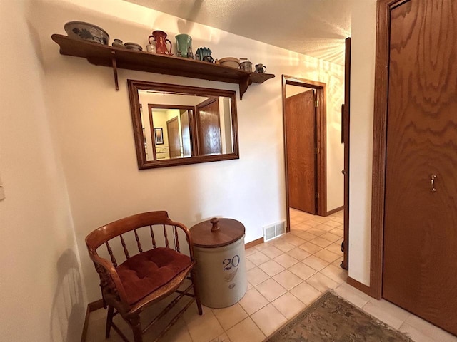 12541 Fleetwood Rd, Tomah, WI 54660 - hallway with light tile patterned floors and baseboards