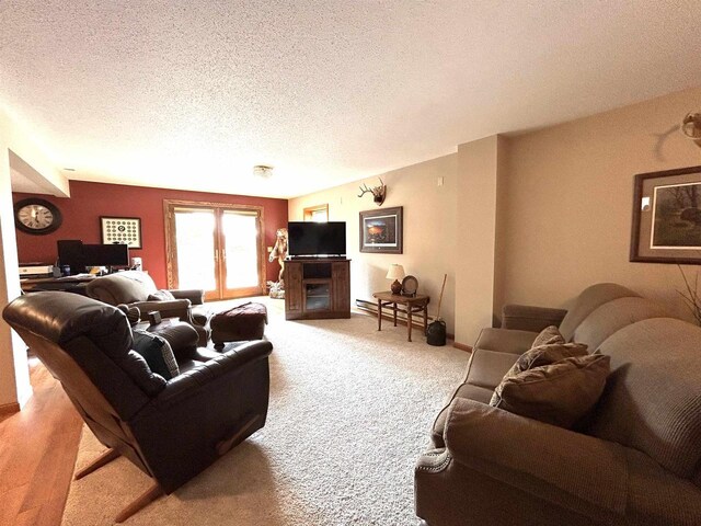 12541 Fleetwood Rd, Tomah, WI 54660 - living room featuring a textured ceiling and carpet flooring