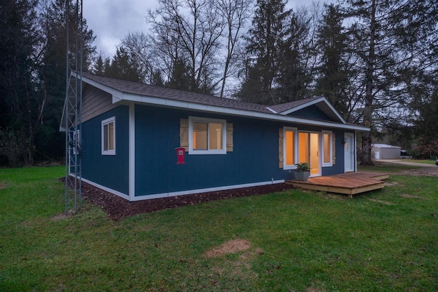 N3725 County Road Ee, Redgranite, WI 54970 - ranch-style home featuring a front lawn and a deck