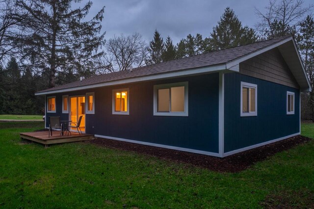 N3725 County Road Ee, Redgranite, WI 54970 - rear view of house featuring a yard and roof with shingles