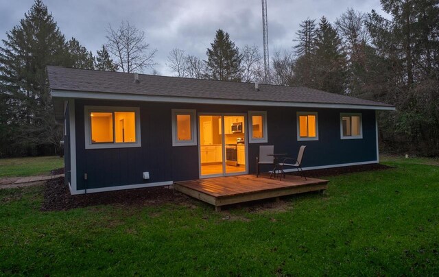 N3725 County Road Ee, Redgranite, WI 54970 - rear view of property featuring a yard and a deck