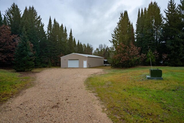 N3725 County Road Ee, Redgranite, WI 54970 - detached garage with dirt driveway