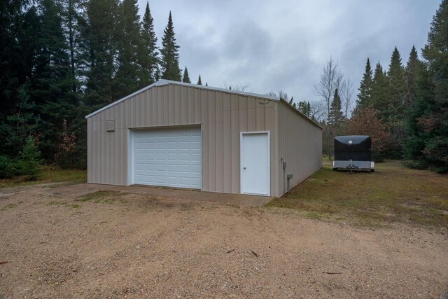 N3725 County Road Ee, Redgranite, WI 54970 - detached garage with dirt driveway
