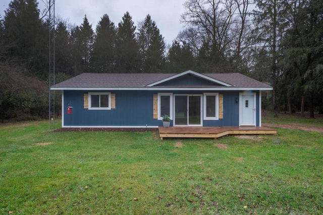 N3725 County Road Ee, Redgranite, WI 54970 - view of front facade featuring a wooden deck and a front lawn