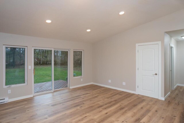 N3725 County Road Ee, Redgranite, WI 54970 - unfurnished room featuring light wood-type flooring, baseboards, and recessed lighting