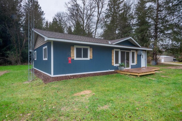 N3725 County Road Ee, Redgranite, WI 54970 - ranch-style house with a wooden deck and a front lawn