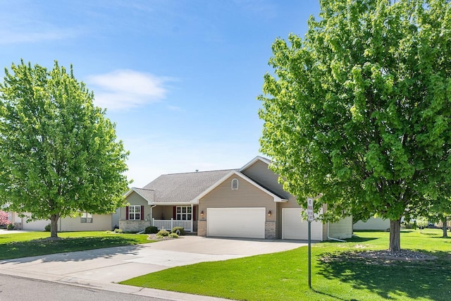 2891 Yellow Jasmine Way, Green Bay, WI 54313 - view of front of property featuring a garage, a front lawn, driveway, a porch, and brick siding
