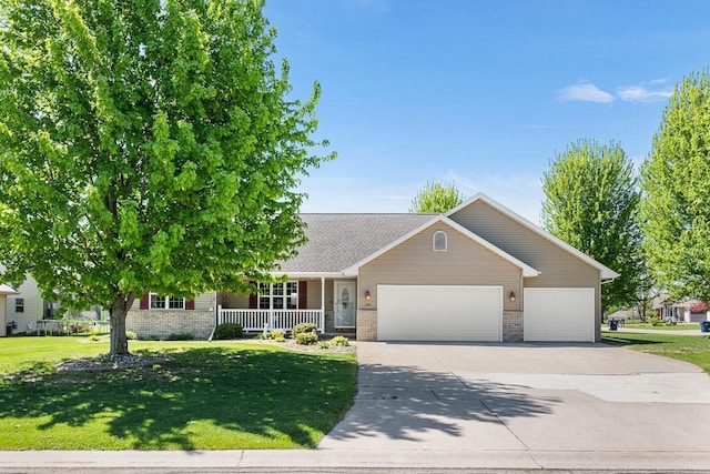 2891 Yellow Jasmine Way, Green Bay, WI 54313 - view of front of house featuring a porch, concrete driveway, a garage, brick siding, and a front yard