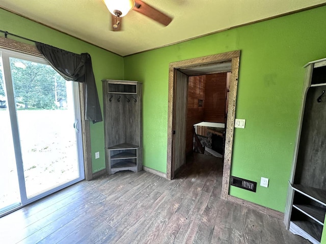 6111 Magnolia Dr, Wisconsin Rapids, WI 54494 - unfurnished bedroom featuring access to outside, wood finished floors, baseboards, and a ceiling fan