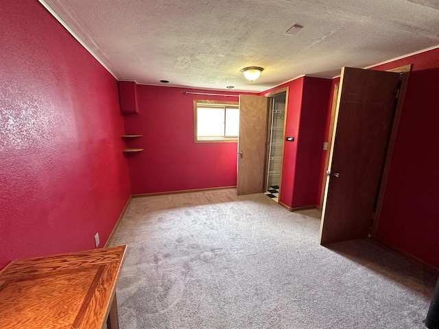 6111 Magnolia Dr, Wisconsin Rapids, WI 54494 - unfurnished bedroom featuring a textured ceiling and carpet floors