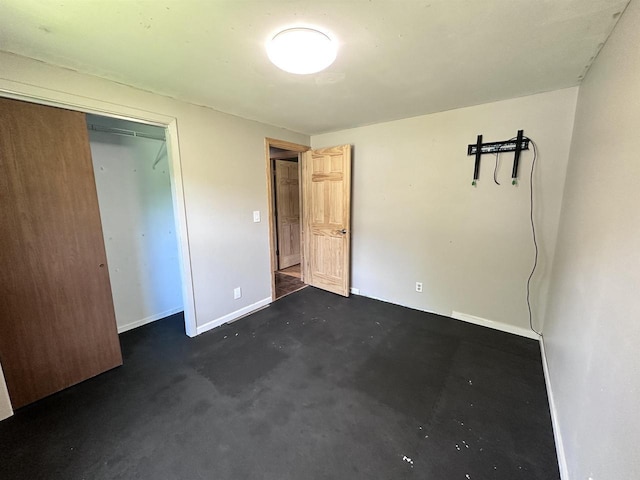 6111 Magnolia Dr, Wisconsin Rapids, WI 54494 - unfurnished bedroom with baseboards and a closet