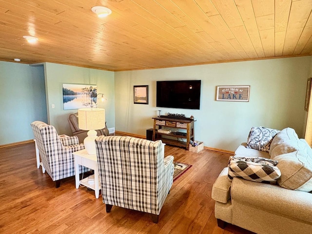 7002 Wildwood Ln, Rhinelander, WI 54501 - living area featuring wood finished floors, wood ceiling, baseboards, and crown molding