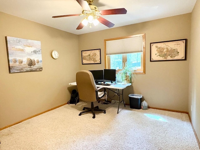 7002 Wildwood Ln, Rhinelander, WI 54501 - carpeted office with baseboards and a ceiling fan