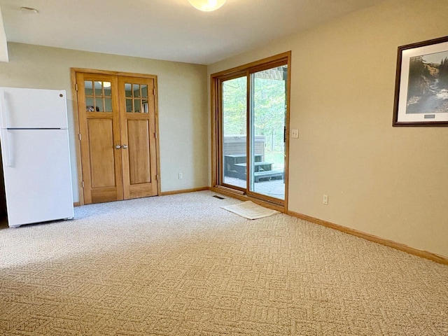 7002 Wildwood Ln, Rhinelander, WI 54501 - unfurnished room with baseboards and carpet
