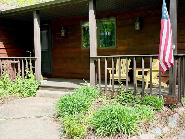 7002 Wildwood Ln, Rhinelander, WI 54501 - entrance to property featuring covered porch