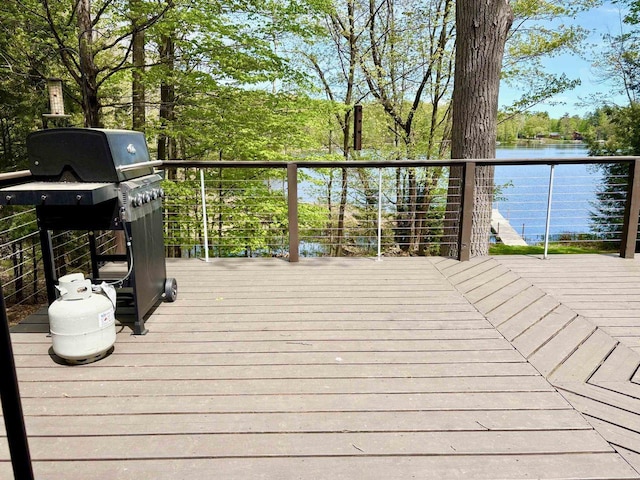 7002 Wildwood Ln, Rhinelander, WI 54501 - wooden terrace with a water view and area for grilling