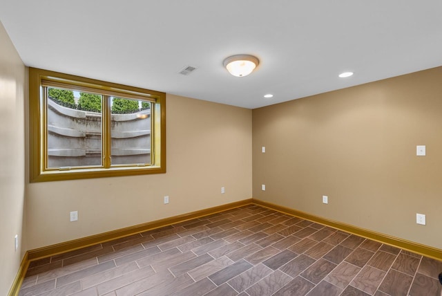 N51W15940 Fair Oak Pkwy, Menomonee Falls, WI 53051 - unfurnished room with baseboards and recessed lighting