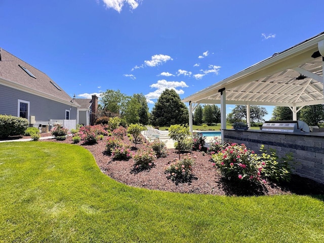 5021 Sherwood Ct, Burlington, WI 53105 - view of grassy yard with a ceiling fan and an outdoor pool
