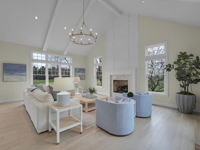 5021 Sherwood Ct, Burlington, WI 53105 - living area featuring high vaulted ceiling, light wood-type flooring, beamed ceiling, baseboards, and plenty of natural light