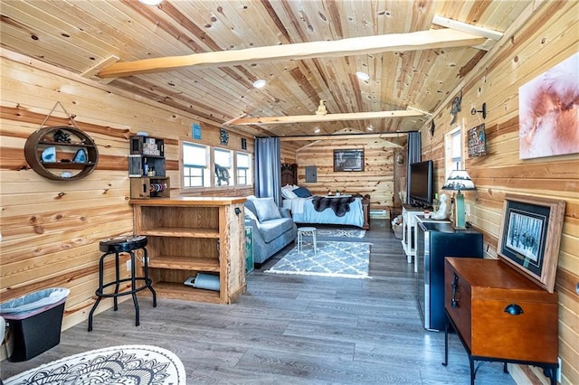 W14312 Montgomery Rd, Hixton, WI 54635 - living area featuring wooden ceiling, wooden walls, and wood finished floors