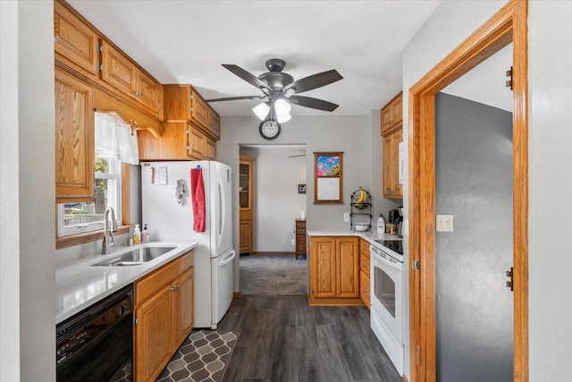 1941 Beulah Ave, East Troy, WI 53120 - kitchen with white appliances, a sink, dark wood-style flooring, ceiling fan, and light countertops