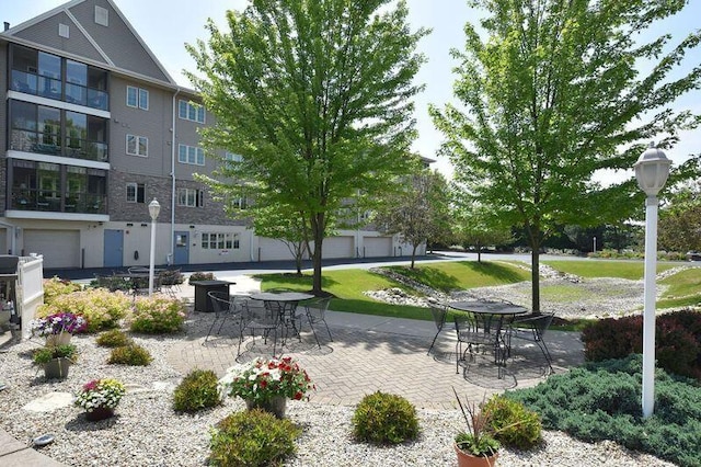 2142 Chateau Ct Unit 308-2, Grafton, WI 53024 - view of property's community featuring a patio