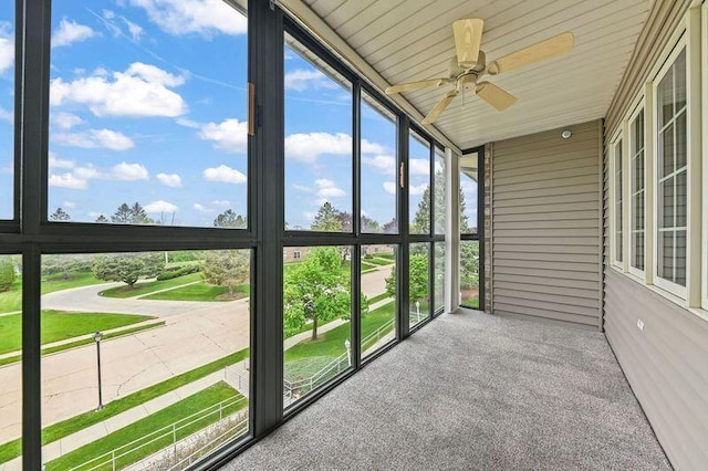 2142 Chateau Ct Unit 308-2, Grafton, WI 53024 - unfurnished sunroom featuring ceiling fan