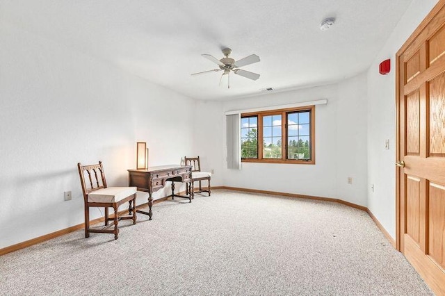 2142 Chateau Ct Unit 308-2, Grafton, WI 53024 - living area featuring light carpet, ceiling fan, and baseboards