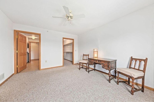 2142 Chateau Ct Unit 308-2, Grafton, WI 53024 - living area featuring baseboards, carpet, and a ceiling fan