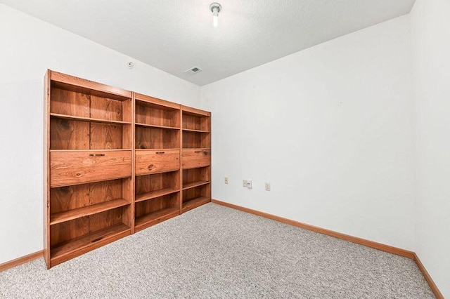 2142 Chateau Ct Unit 308-2, Grafton, WI 53024 - carpeted empty room with baseboards