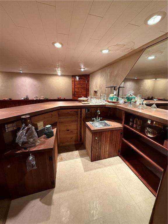 51 Stump Lake Rd, Chippewa Falls, WI 54729 - indoor wet bar with light floors and recessed lighting