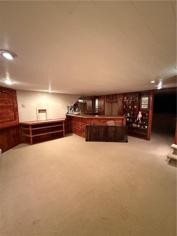 51 Stump Lake Rd, Chippewa Falls, WI 54729 - carpeted home theater room featuring bar area