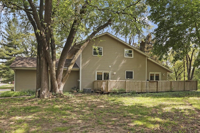 N7094 Evergreen Ln, Elkhorn, WI 53121 - back of house featuring a chimney and a wooden deck
