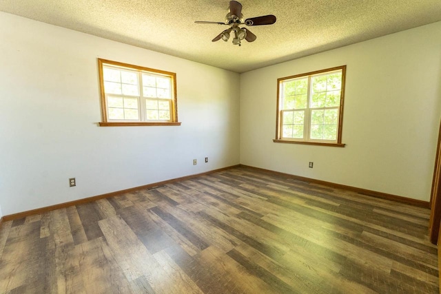 715 Farmer Ave, Tomah, WI 54660 - unfurnished room with wood finished floors, a textured ceiling, ceiling fan, and baseboards
