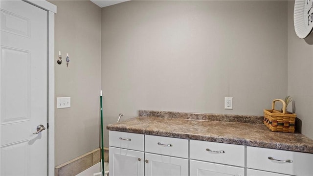 3312 White Oak Ln, Eau Claire, WI 54703 - bathroom featuring baseboards