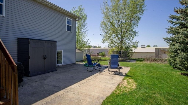 3312 White Oak Ln, Eau Claire, WI 54703 - view of grassy yard with a patio area