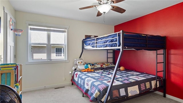 3312 White Oak Ln, Eau Claire, WI 54703 - carpeted bedroom featuring baseboards and ceiling fan