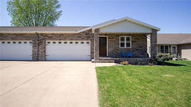 3312 White Oak Ln, Eau Claire, WI 54703 - view of front of house with a porch, an attached garage, a front yard, concrete driveway, and stone siding
