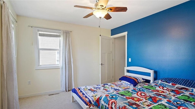 3312 White Oak Ln, Eau Claire, WI 54703 - bedroom featuring ceiling fan and carpet flooring