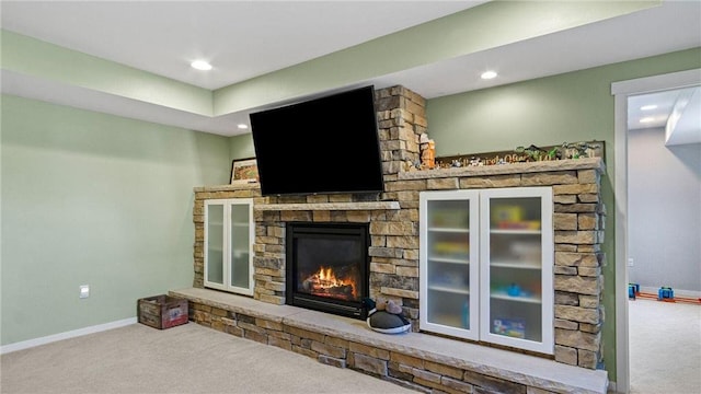 3312 White Oak Ln, Eau Claire, WI 54703 - living area with carpet flooring, baseboards, a fireplace, and recessed lighting