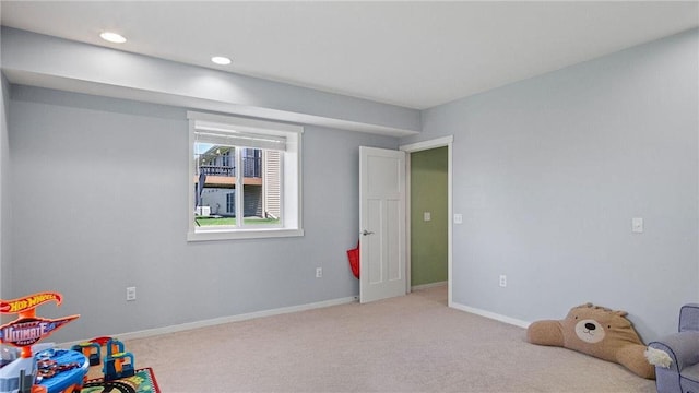 3312 White Oak Ln, Eau Claire, WI 54703 - playroom featuring carpet floors, baseboards, and recessed lighting