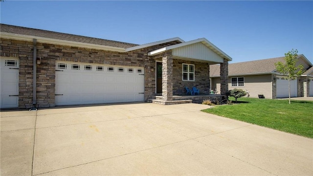 3312 White Oak Ln, Eau Claire, WI 54703 - view of front of property with covered porch, driveway, a garage, a front lawn, and stone siding