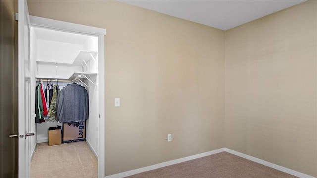 3312 White Oak Ln, Eau Claire, WI 54703 - unfurnished bedroom with light colored carpet and baseboards