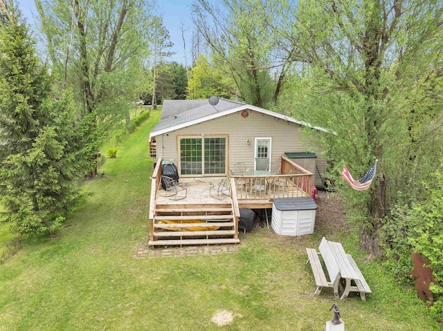 W6576 20th Dr, Wautoma, WI 54982 - back of house with a lawn, a deck, and a storage unit