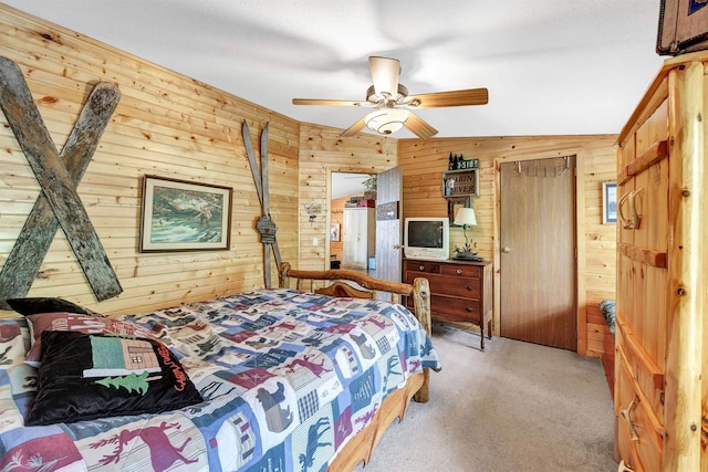W6576 20th Dr, Wautoma, WI 54982 - bedroom with wood walls, light colored carpet, and ceiling fan