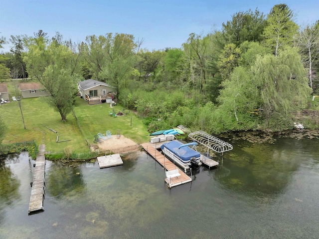 W6576 20th Dr, Wautoma, WI 54982 - dock area with a yard, a water view, and a view of trees